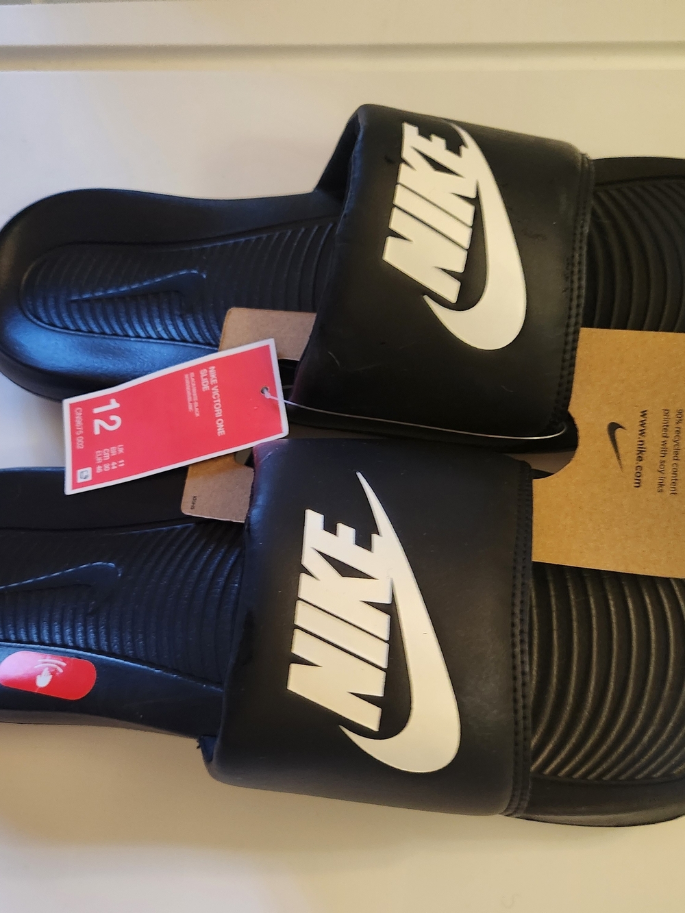 Nike Men’s Black Slide Sandals with White Logo